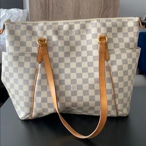 White checkered Louis Vuitton purse